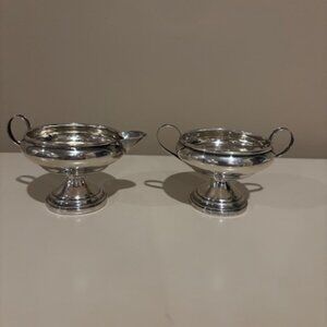 ANTIQUE STERLING SILVER CREAMER & SUGAR BOWL.  REINFORCED WITH CEMENT.